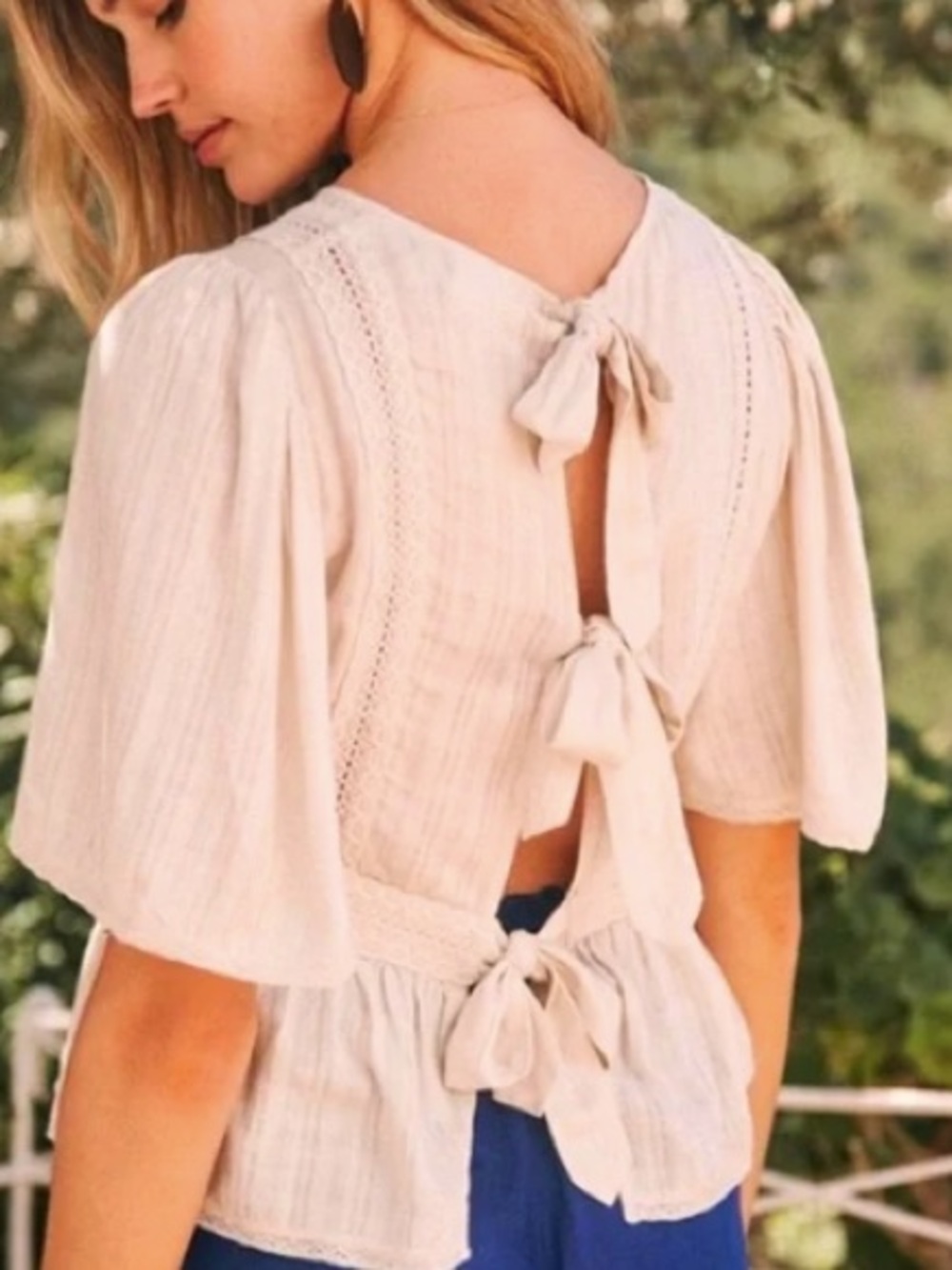 sezane open back bow tieblouse